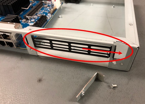 ../_images/xg-7100-1u-remove-faceplate-blank.jpg